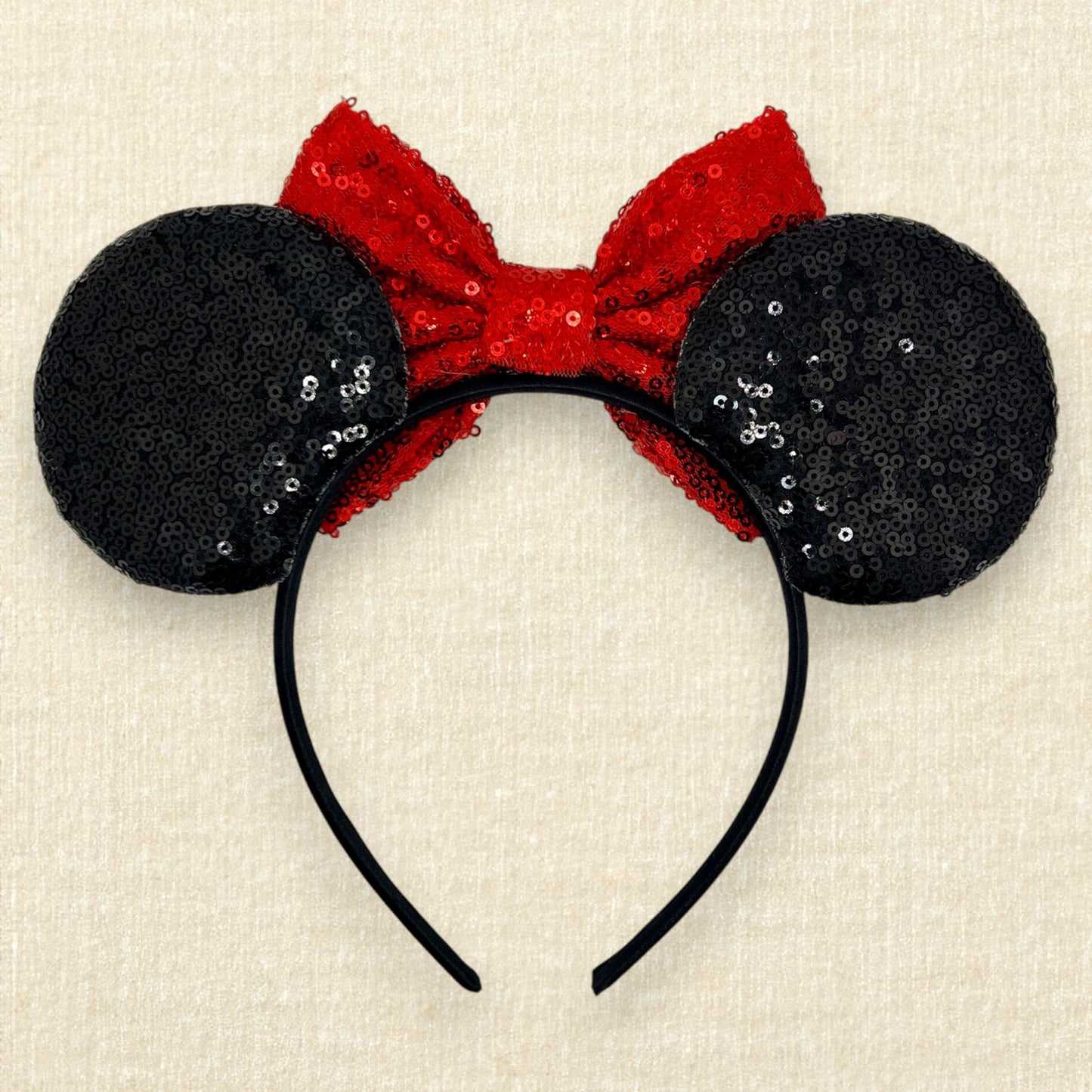 Black sequin mouse ears with red sequin bow (back view)