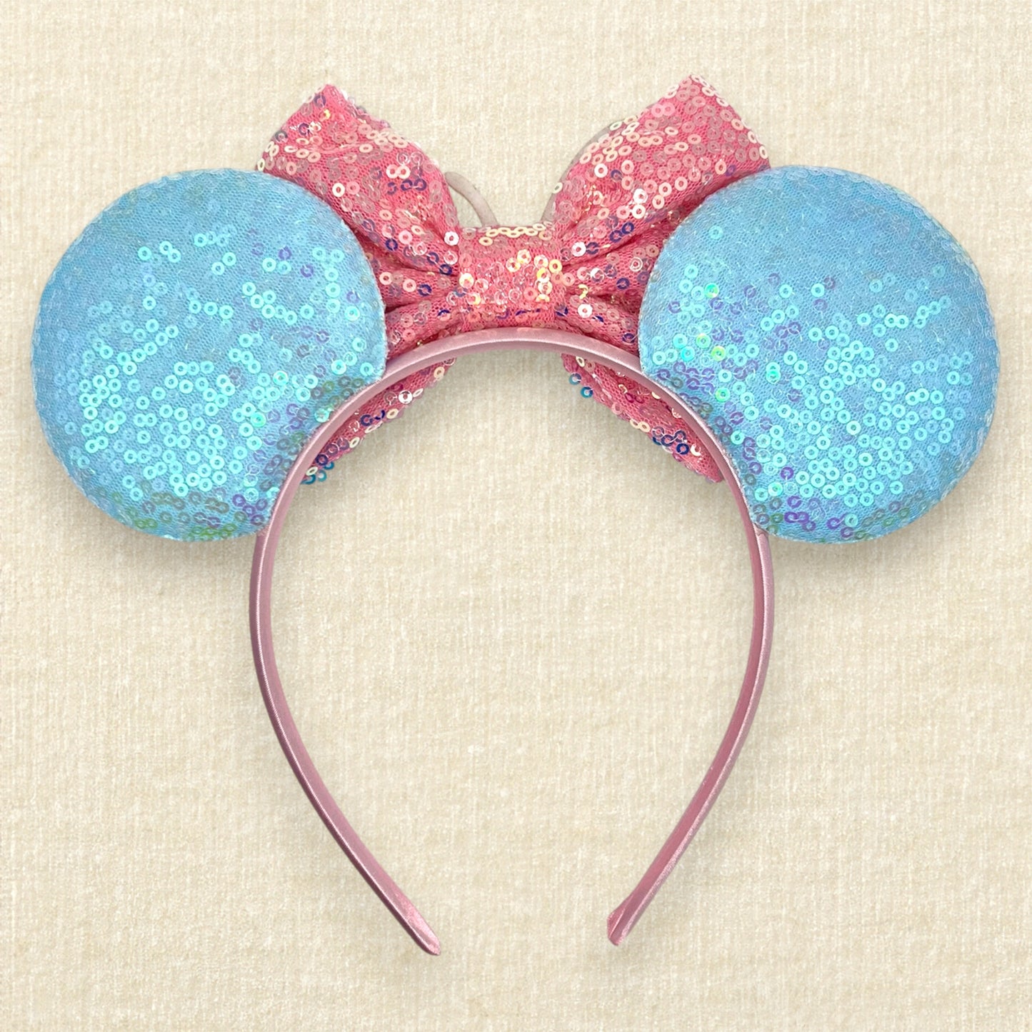 Colorful blue and pink ice cream-themed headband with sprinkles and cherry (back view)
