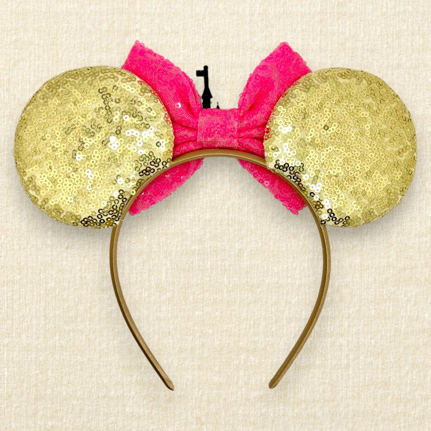 Gold sequin mouse ears with hot pink sequin bow and gold glitter castle (back view)