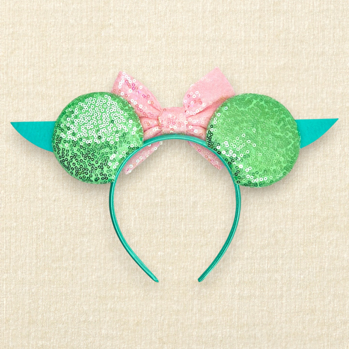 Light green sequin mouse ears headband with pink sequin bow and green and pink alien ears (back view)