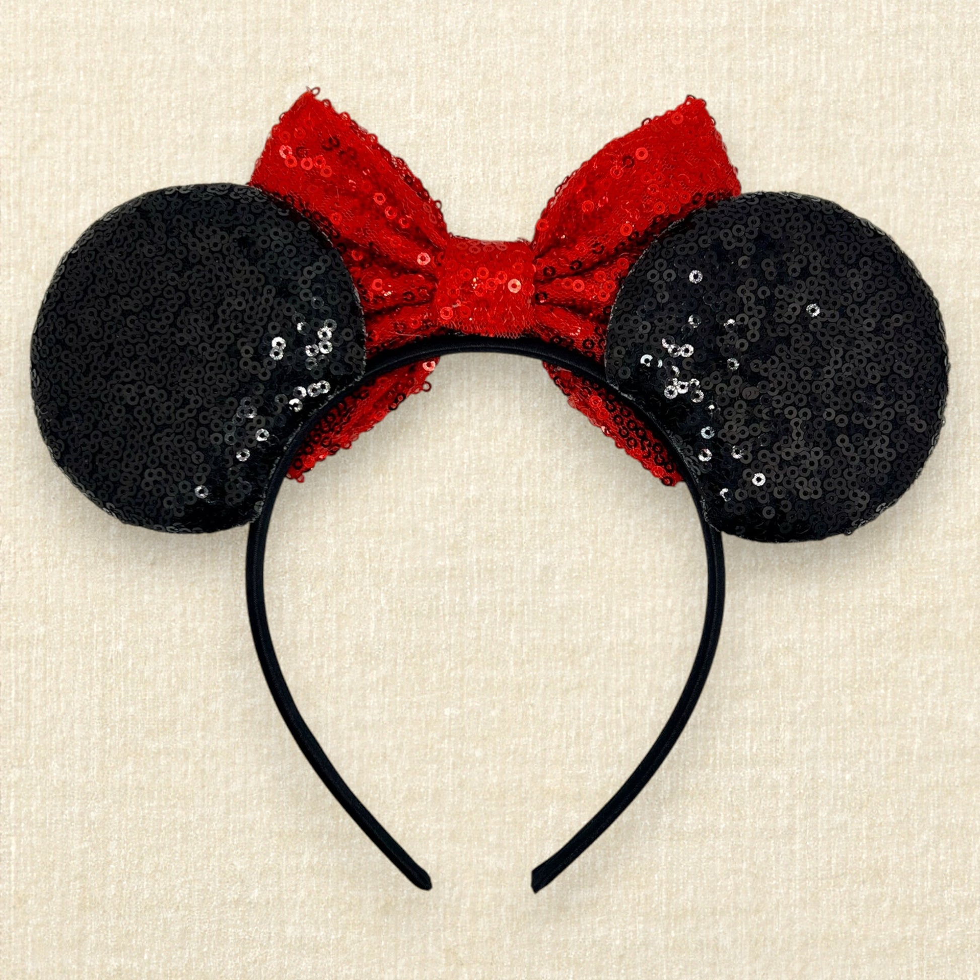 Black sequin mouse ears with red sequin bow (back view)