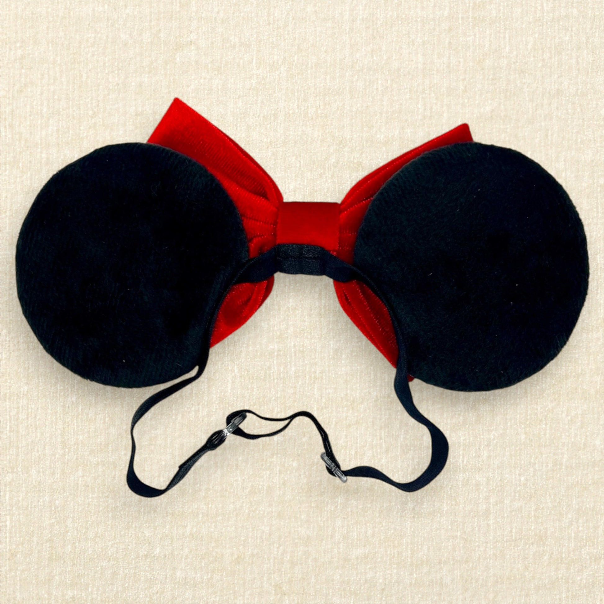 Black velvet mouse ears with red velvet bow on an elastic headband (back view)