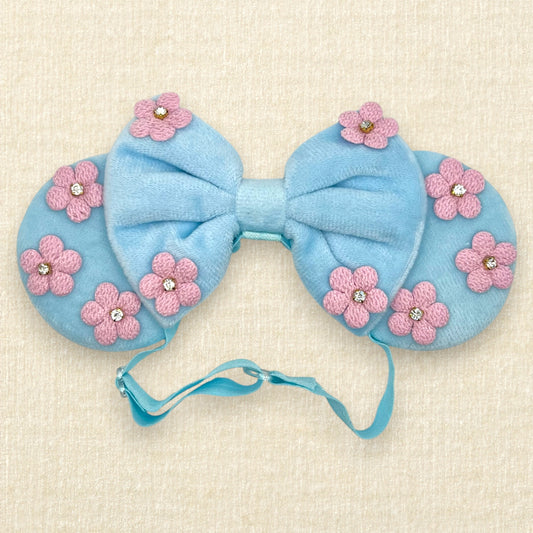 Blue velvet mouse ears and bow with pink fabric flowers on an elastic headband