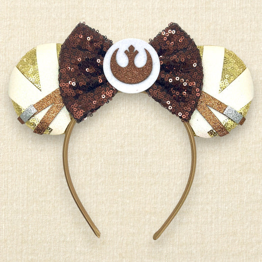 Gold sequin mouse ears with brown and white glitter details, brown sequin bow, and brown glitter emblem