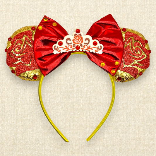Gold mouse ears with red glitter roses, metallic red bow, glitter rose tiara, and rhinestones
