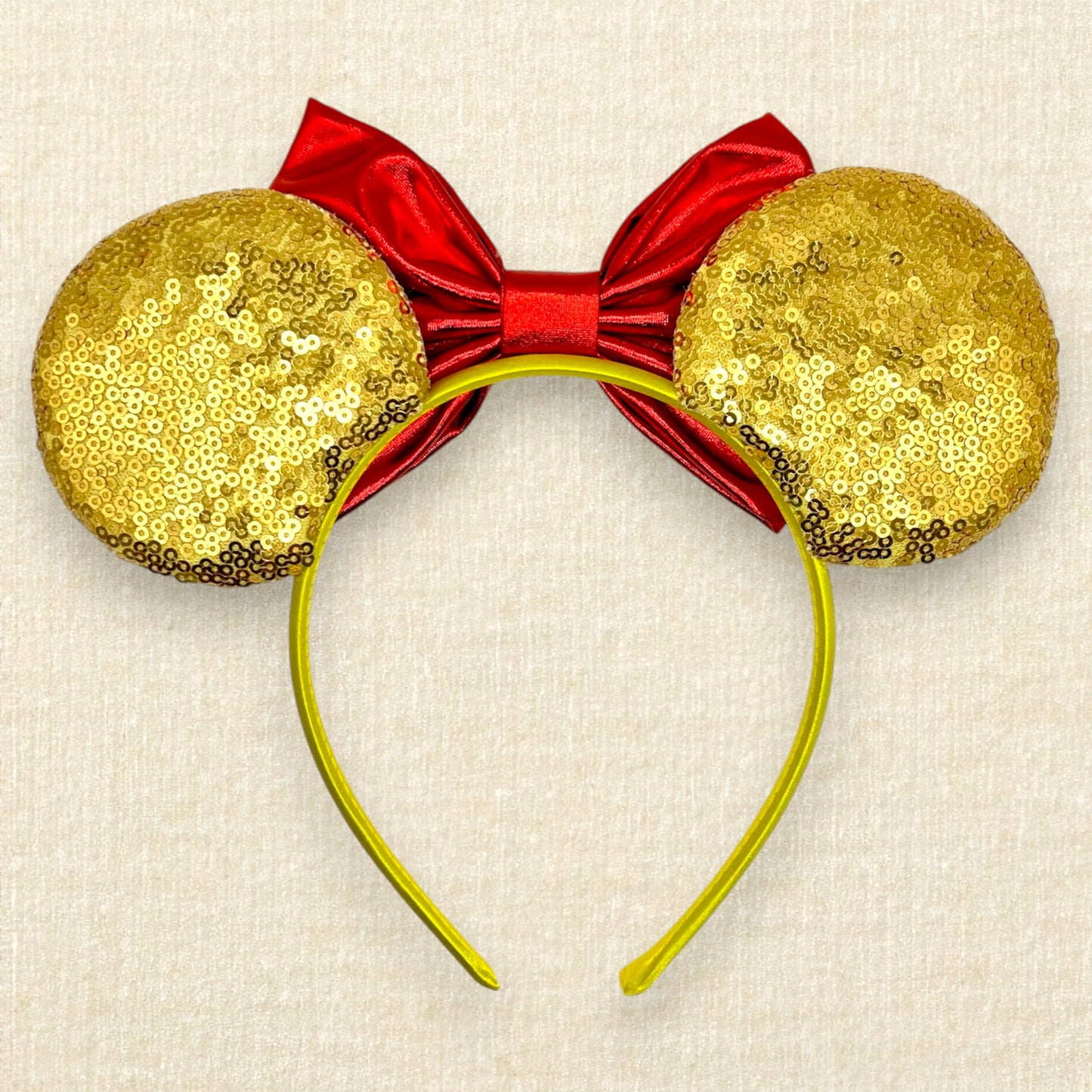 Gold mouse ears with red glitter roses, metallic red bow, glitter rose tiara, and rhinestones (back view)