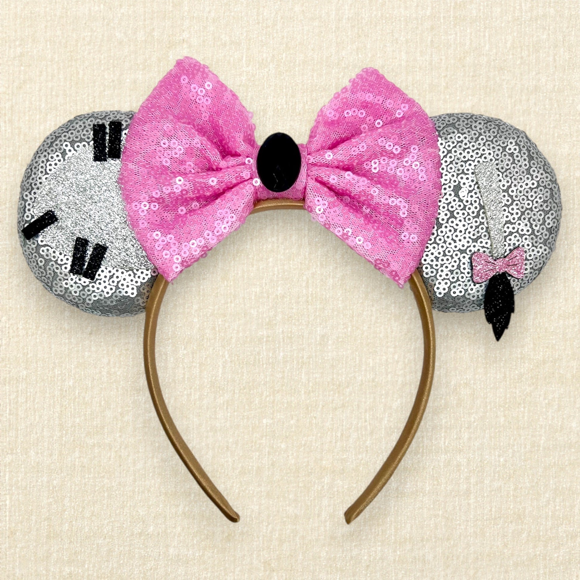 Gray sequin mouse ears headband with donkey-inspired silver glitter details and pink sequin bow