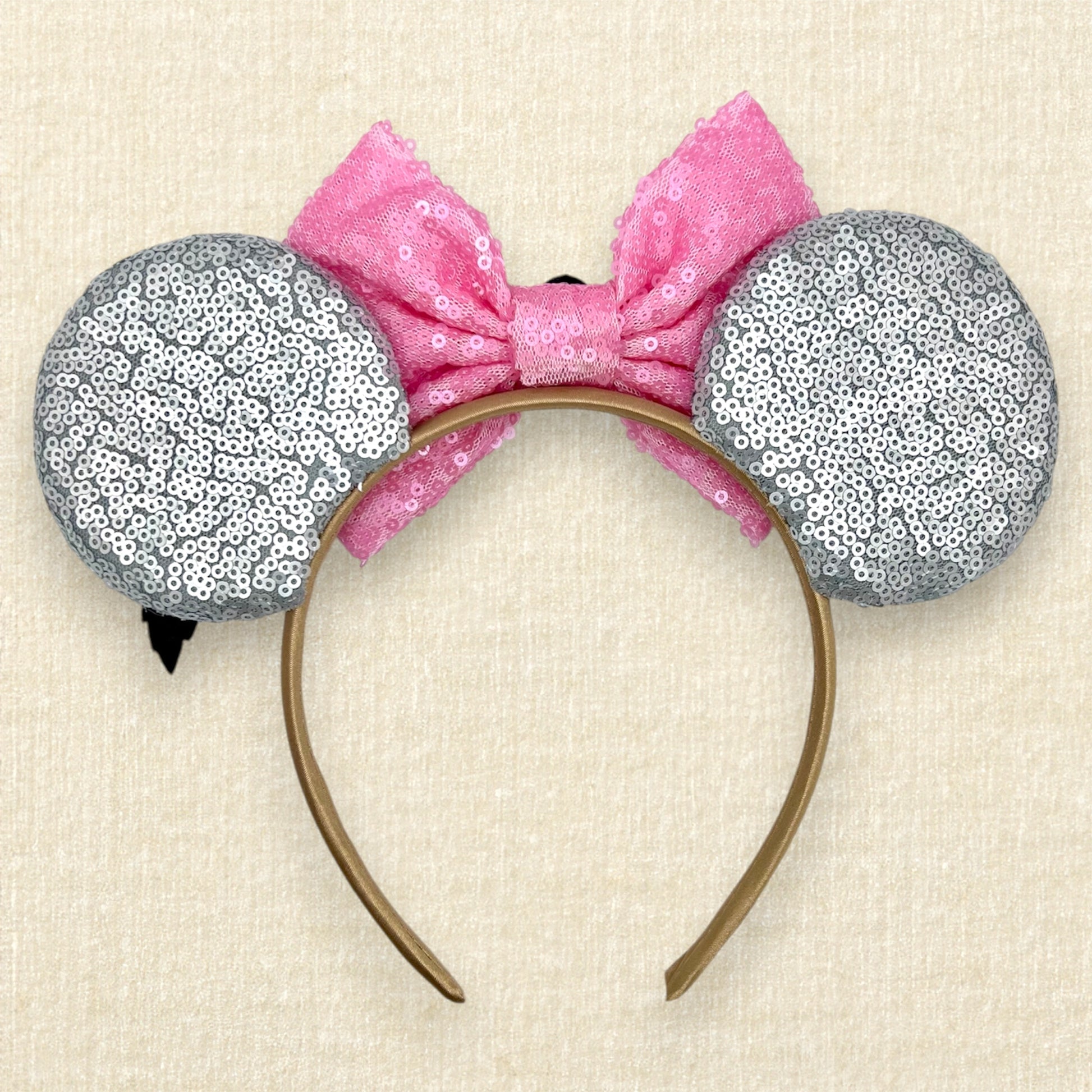 Gray sequin mouse ears headband with donkey-inspired silver glitter details and pink sequin bow (back view)
