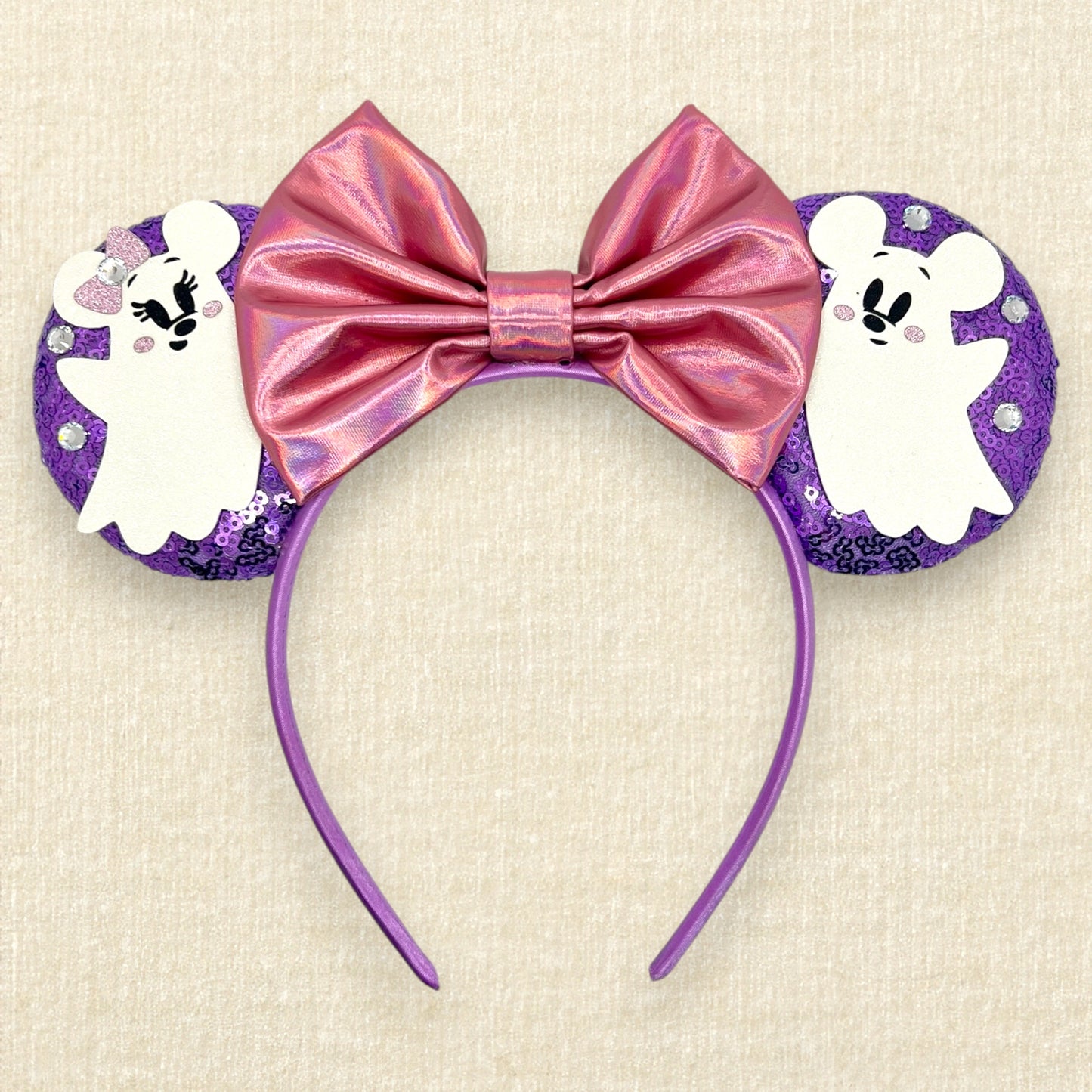 Purple sequin mouse ears with iridescent pink bow and Mickey and Minnie ghosts