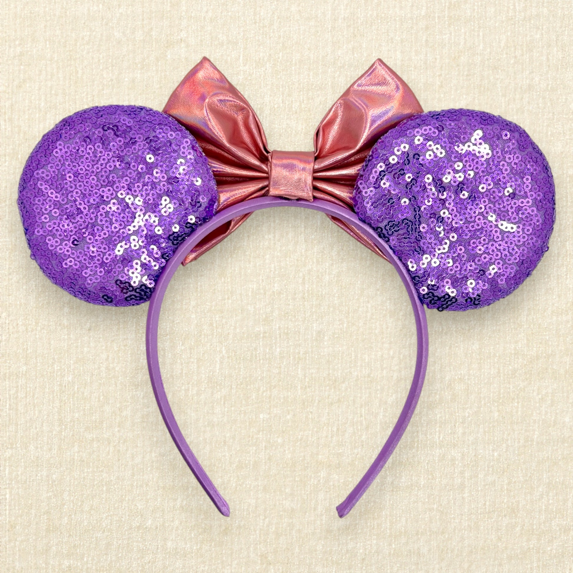 Purple sequin mouse ears with iridescent pink bow and Mickey and Minnie ghosts (back view)