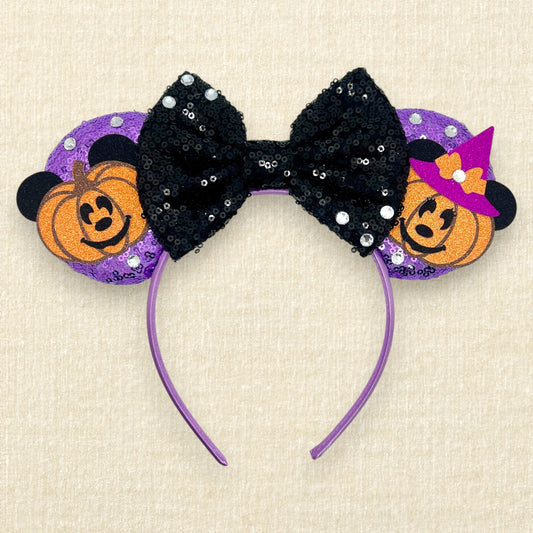 Purple sequin mouse ears with pumpkin Mickey and Minnie and black sequin bow