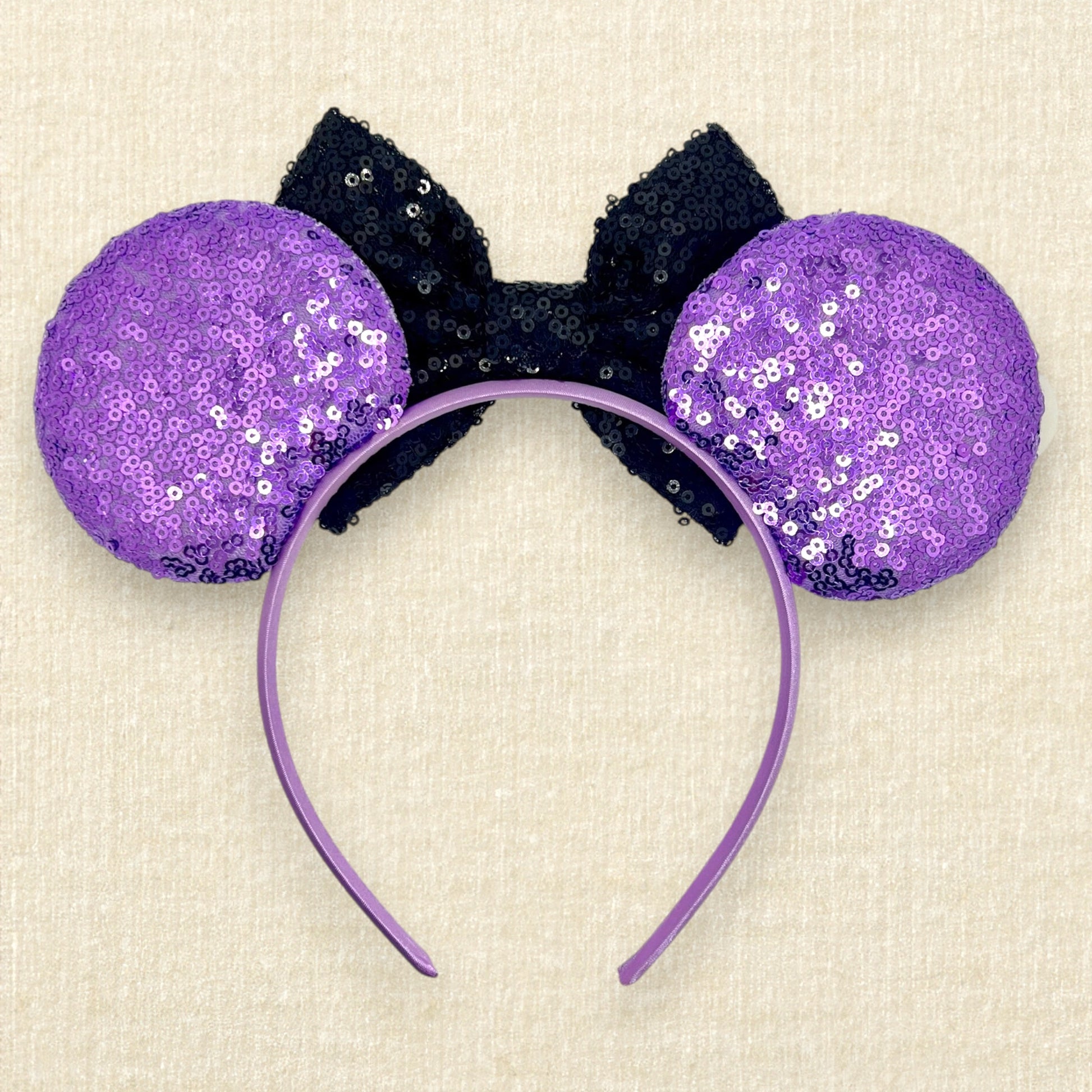 Purple sequin mouse ears with pumpkin Mickey and Minnie and black sequin bow (back view)