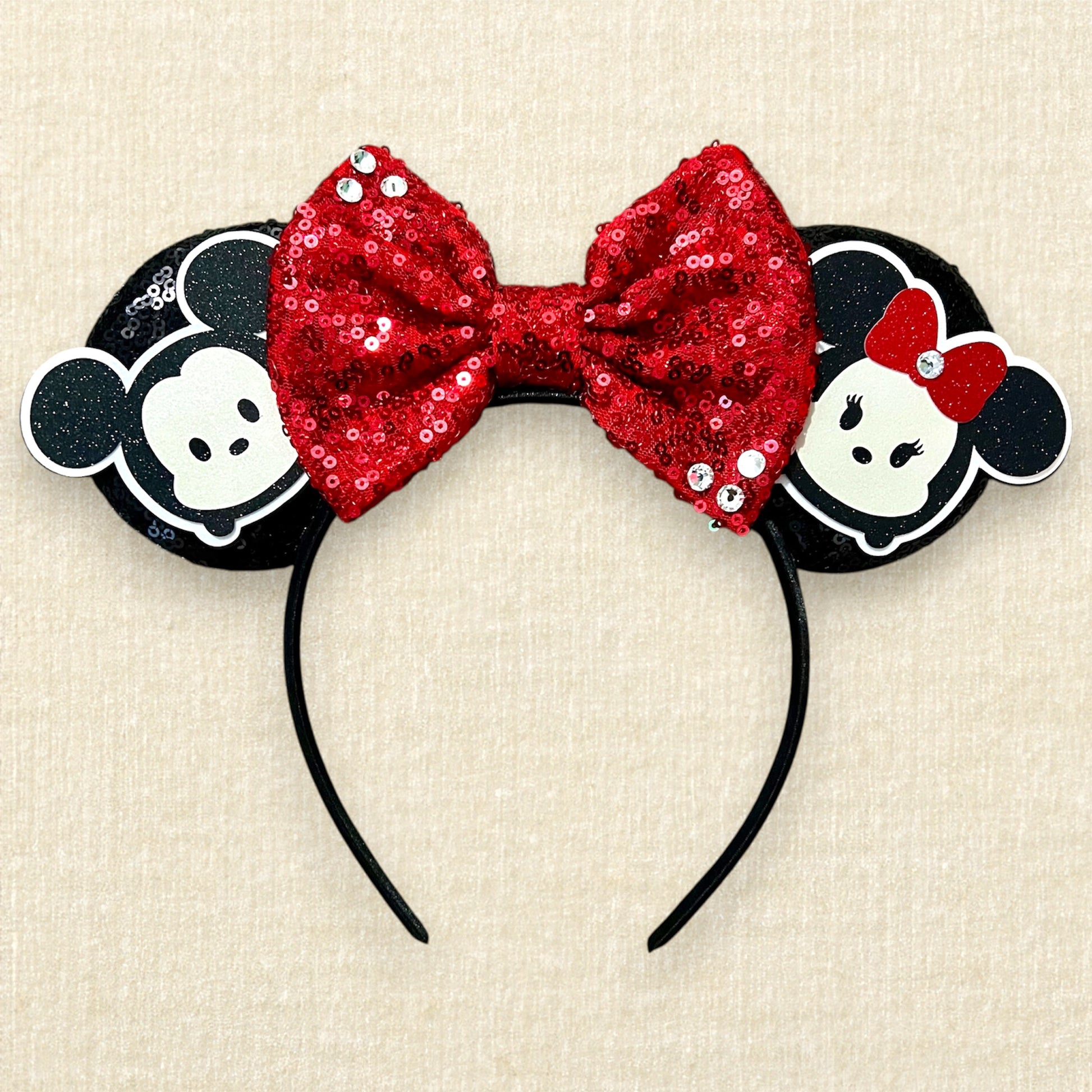 Black sequin mouse ears headband with red sequin bow and glitter mouse characters