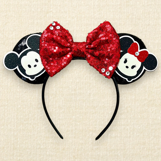 Black sequin mouse ears headband with red sequin bow and glitter mouse characters