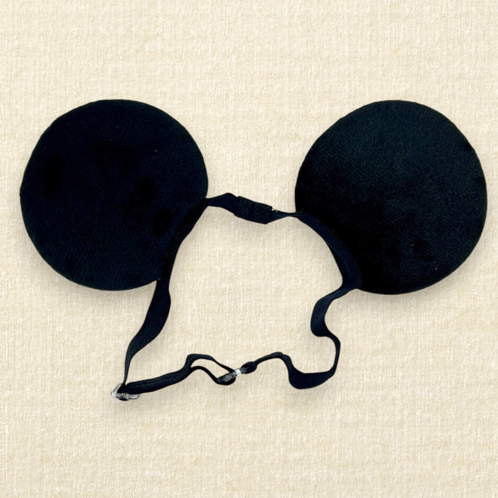 Black velvet bow-free mouse ears on an elastic headband with glitter shorts and glove detail (back view)