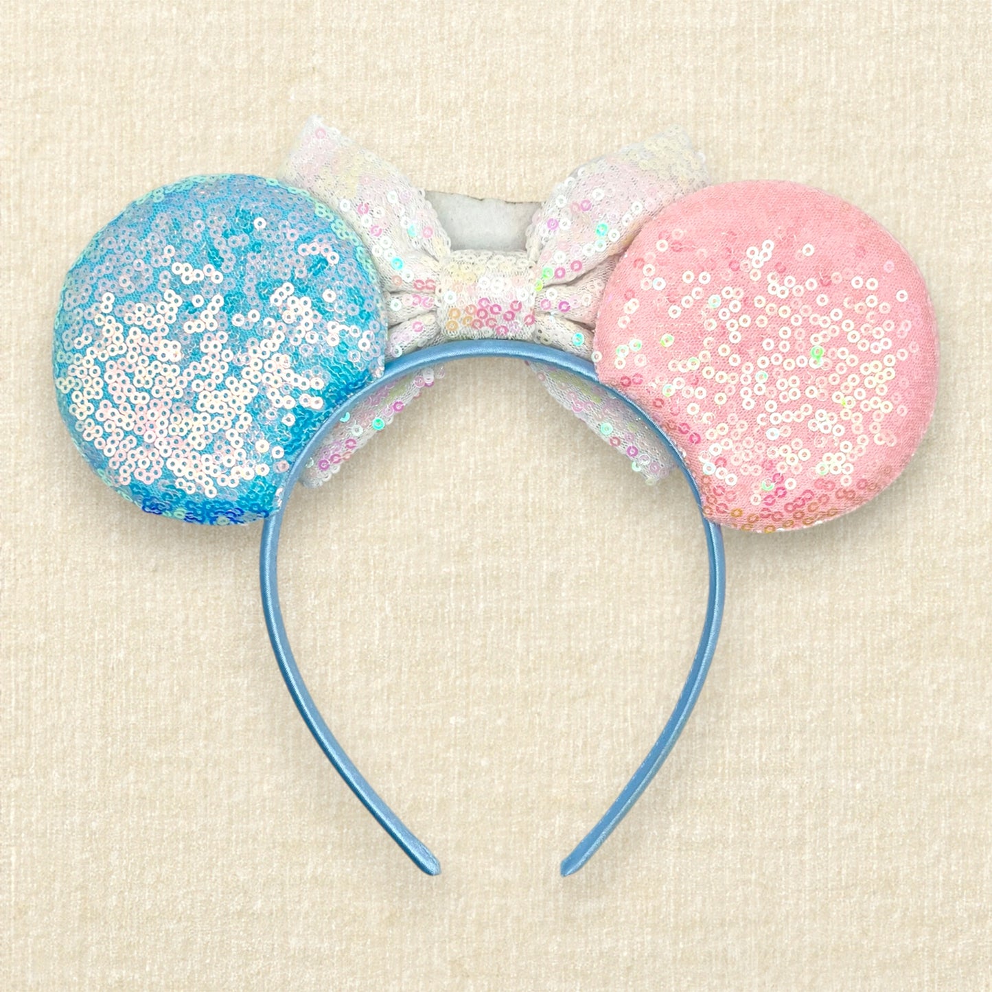 Pink and blue mouse ears with mouse silhouettes, white sequin bow, and colorful "Birthday Girl" text