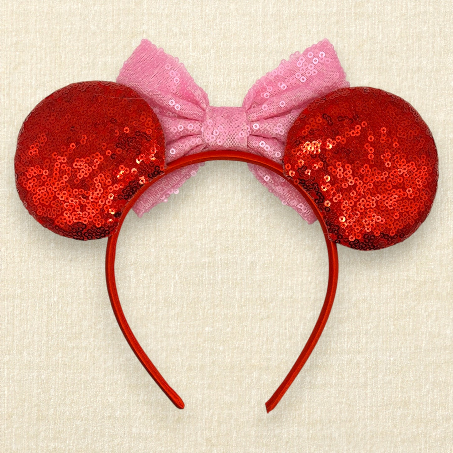 Red sequin mouse ears with a pink sequin bow (back view)
