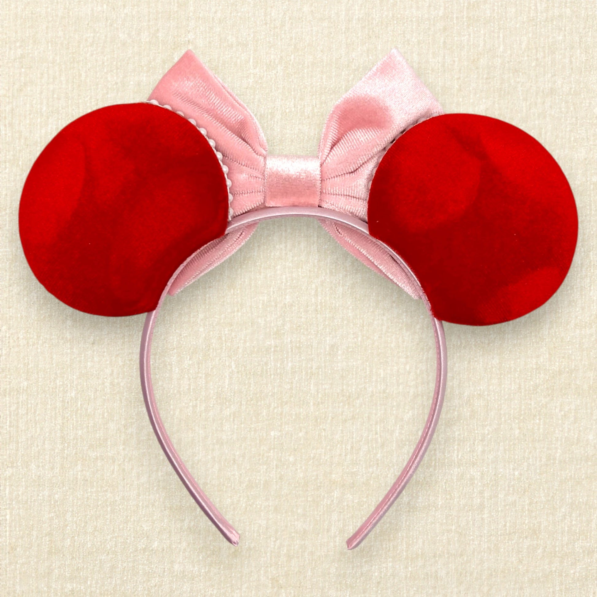 Red velvet mouse ears with mouse and round pearls and pearl trim, with pink velvet bow (back view)