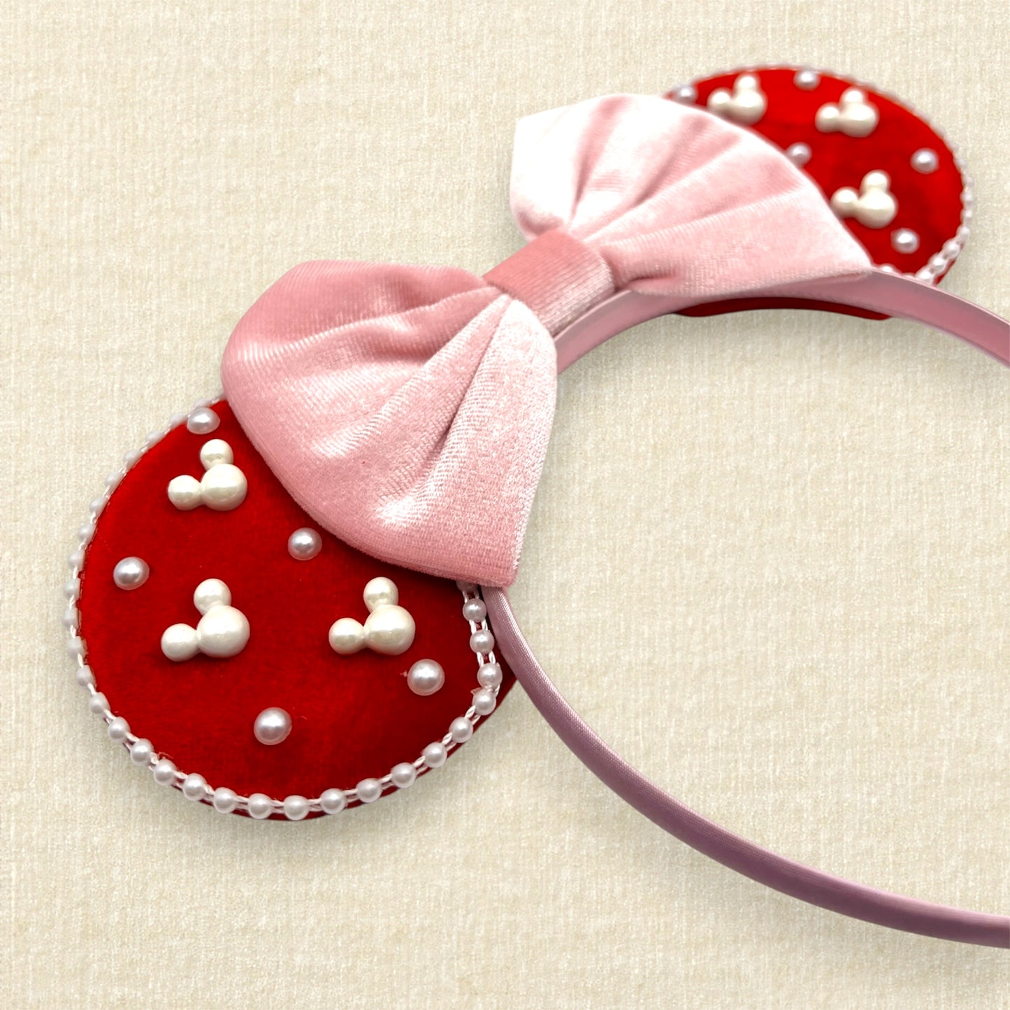 Red velvet mouse ears with mouse and round pearls and pearl trim, with pink velvet bow