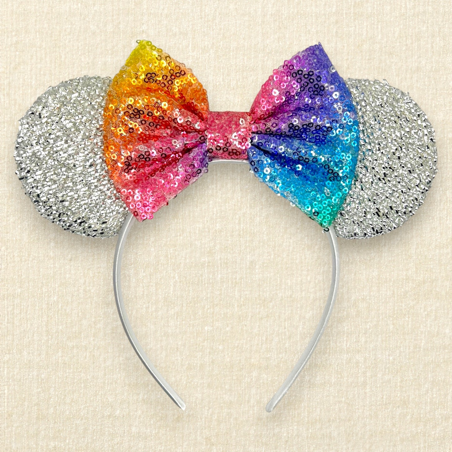Silver mouse ears headband with rainbow sequin bow