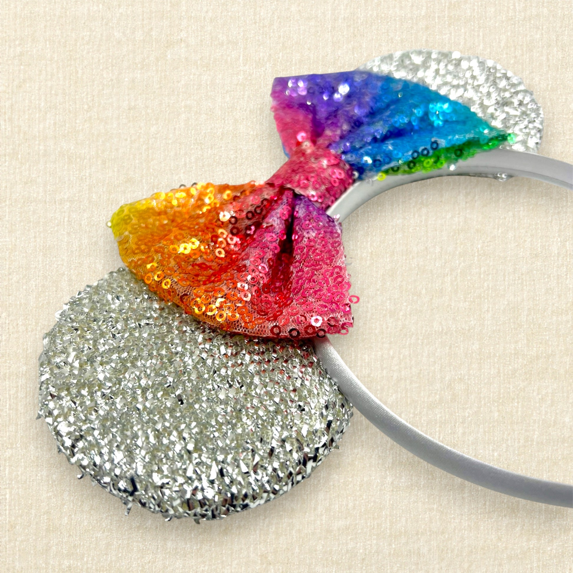 Silver mouse ears headband with rainbow sequin bow
