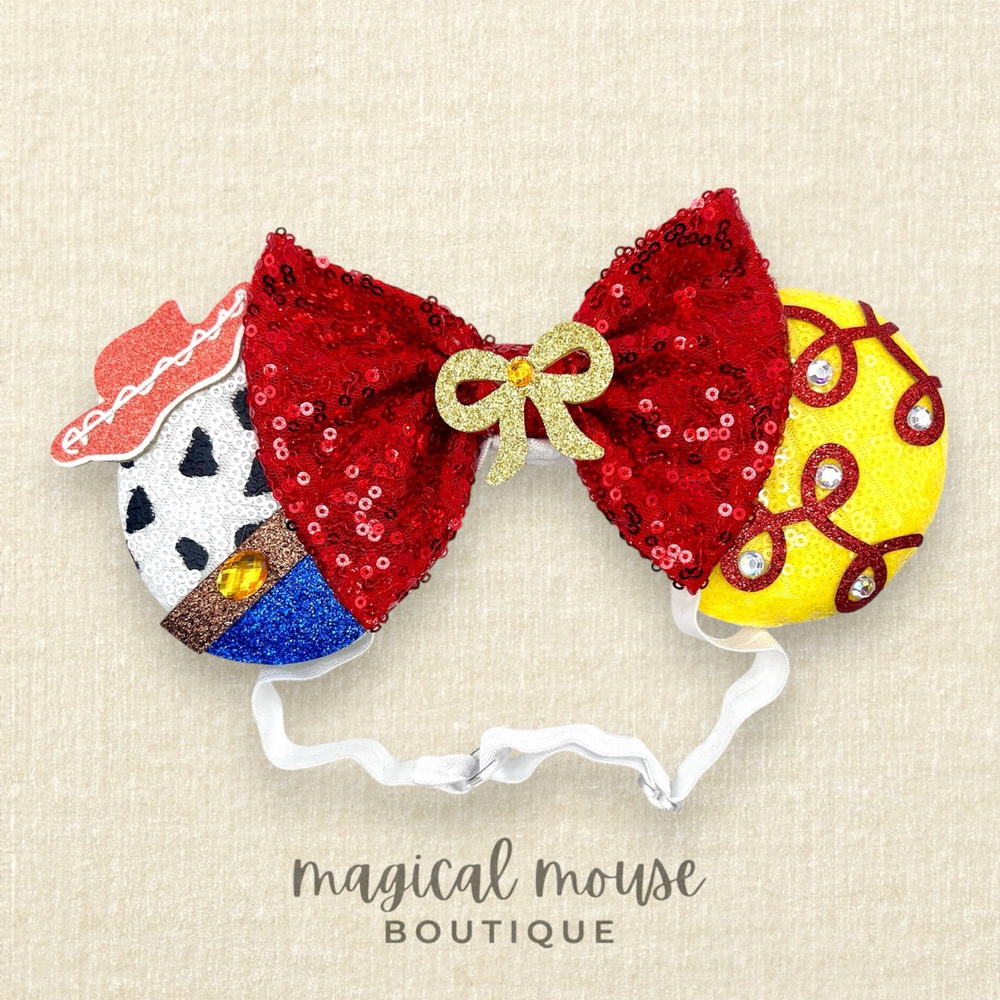 Colorful mouse ears and bow with cowboy designs on a beige background, featuring 'magical mouse Boutique' branding.